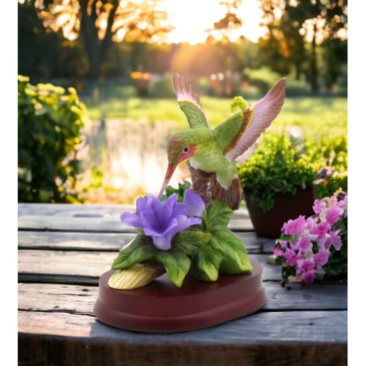 Kevins Gift Shoppe Ceramic Hummingbird with Purple Flower on Wooden Base